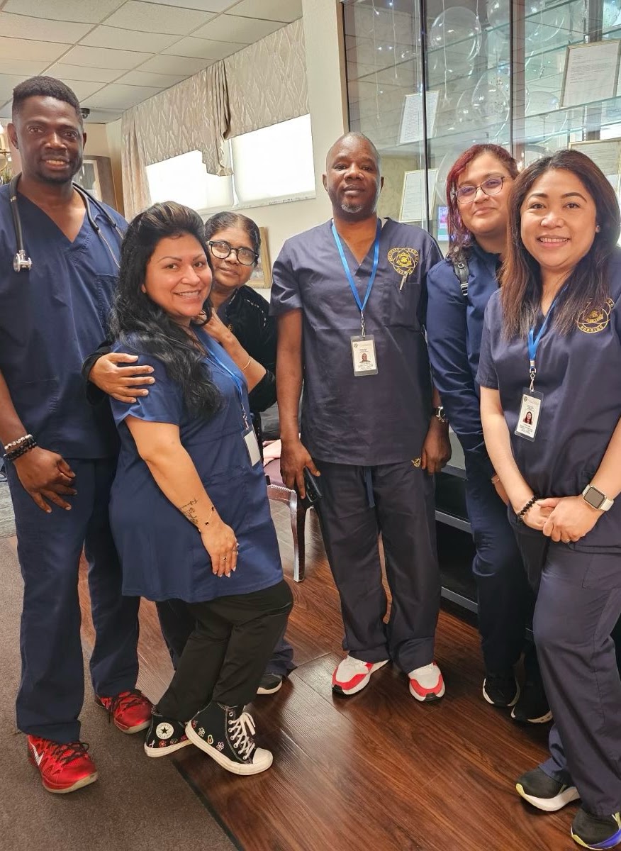 Americare nursing students and faculty in practical nursing uniforms